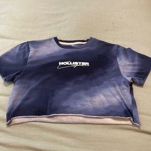 Dark and light blue, cropped shirt.